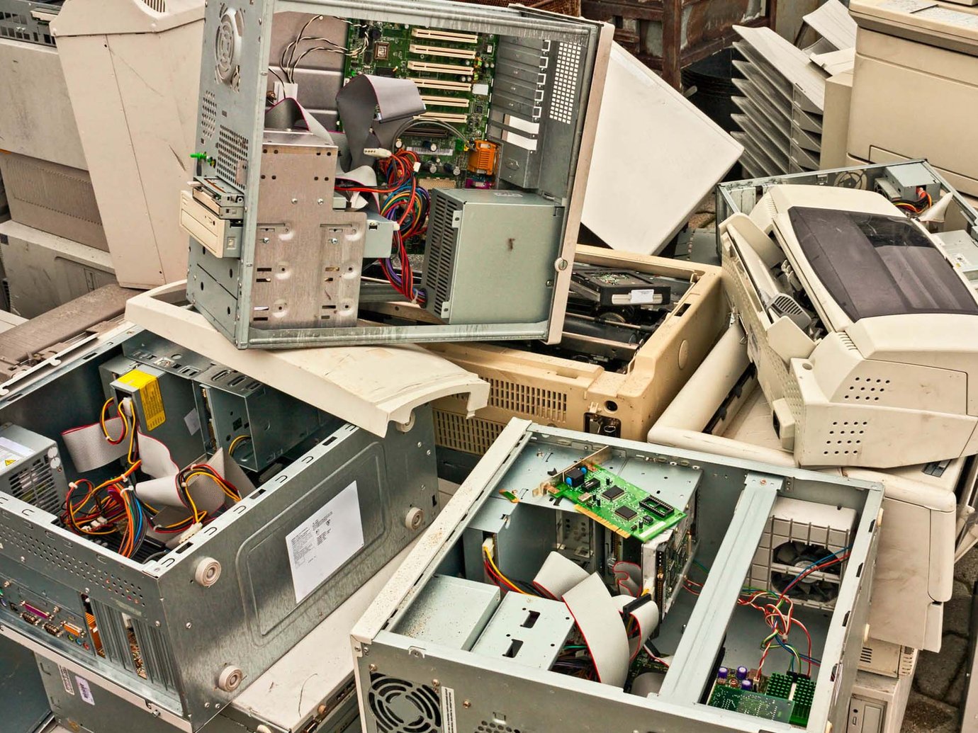 discarded desktop computers. fax machines and printers